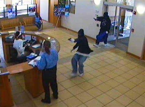 20, 2000, just a day before three masked. . Chicago bank robbed
